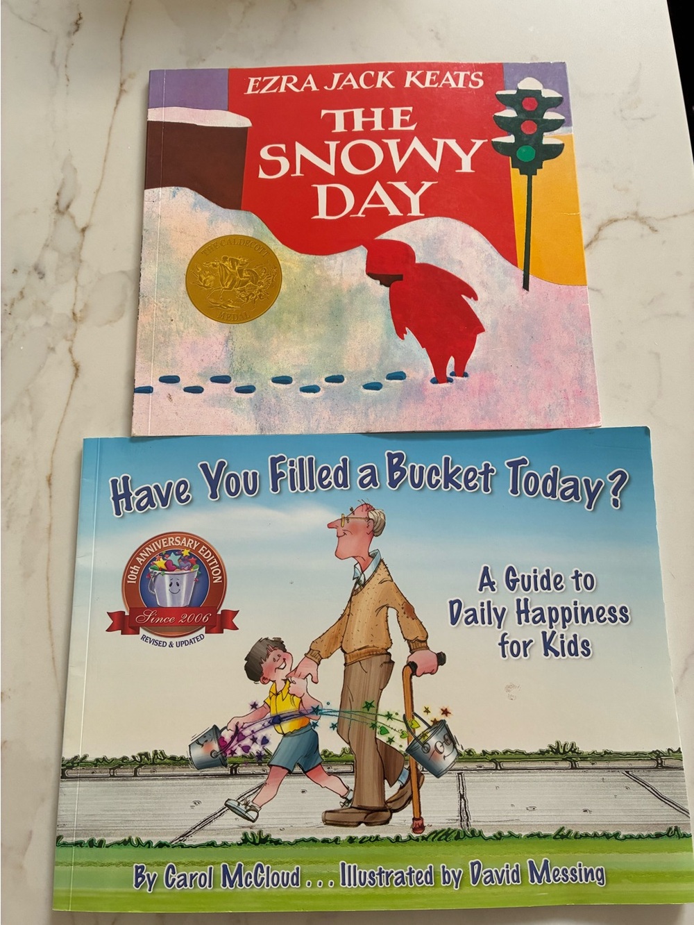 2 children’s picture books: Have You Filled a Bucket Today? & The Snowy Day